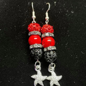 Red twinkled star earrings