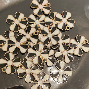 Black white and gold flower charms