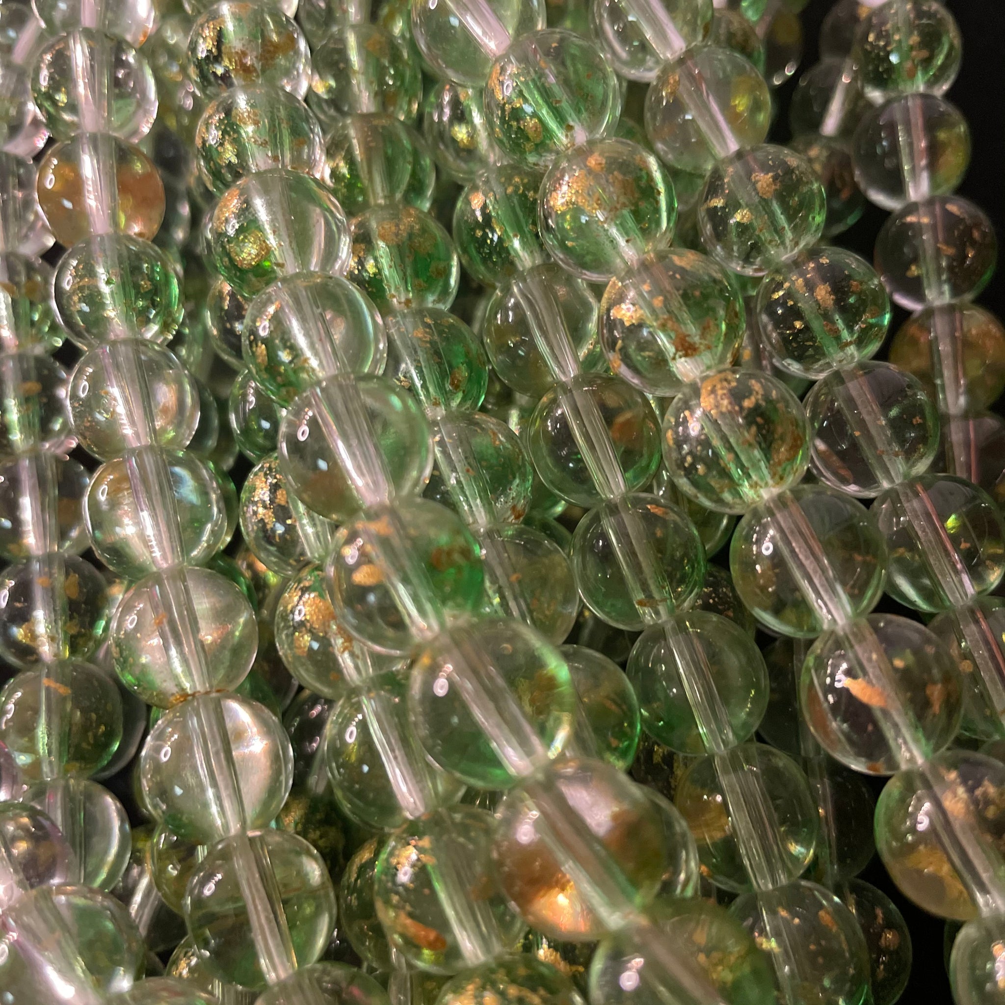 Green splash of gold beads